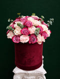 Burgundy velvet flower box with pink and lavender roses, blush hydrangeas, and eucalyptus by Nostalgie Flowers